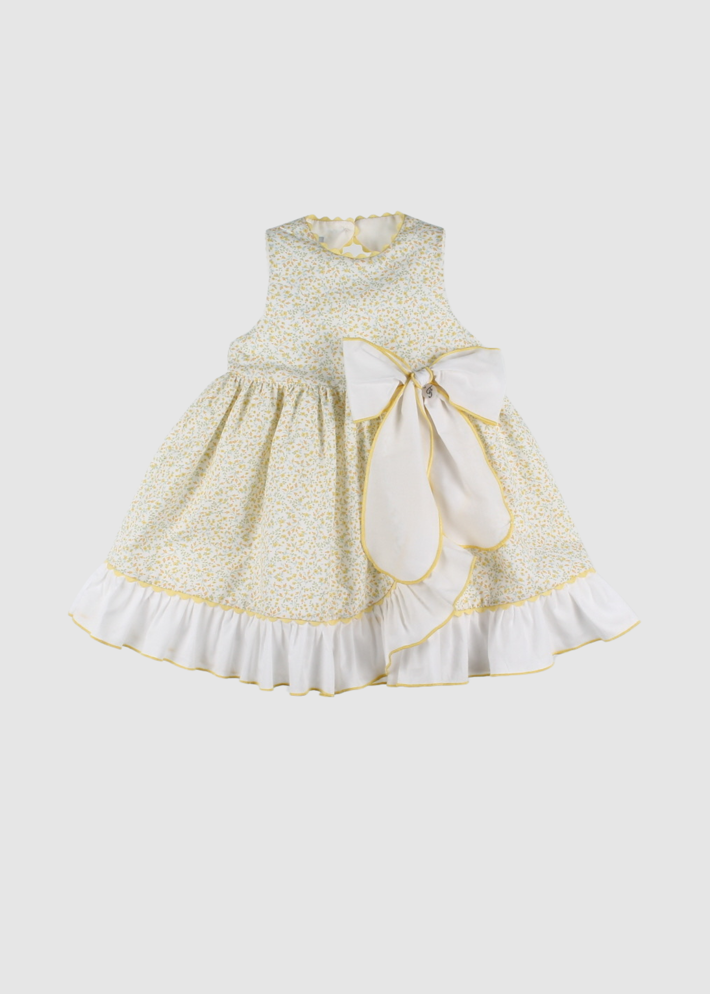 Vestido De Flores Con Volante y Lazada En Bastista Detalles Piquillo